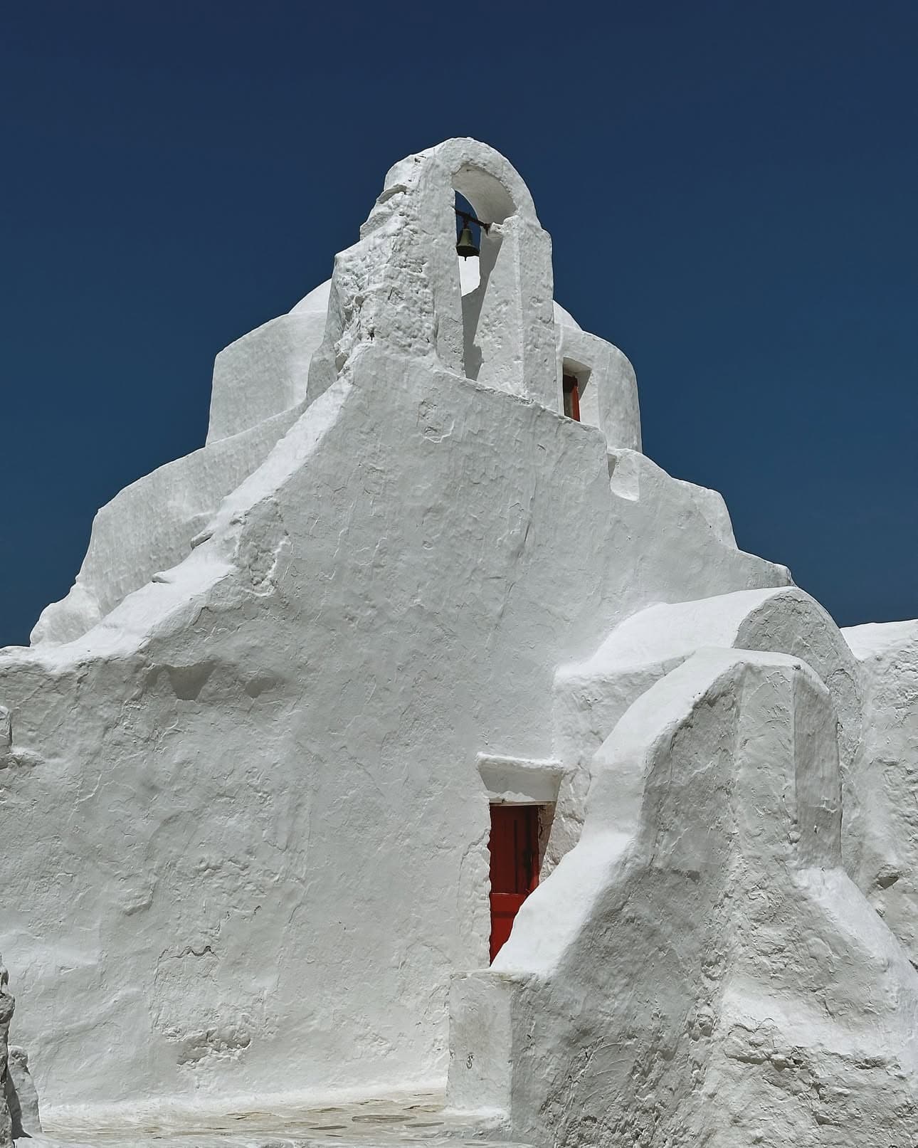 Little Venice and iconic windmills of Mykonos at sunset